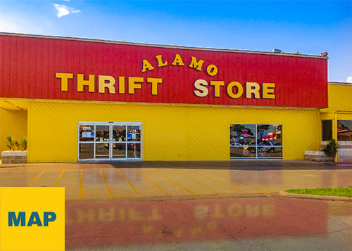 Exterior photograph of PRIME THRIFT Tulsa with blue sky and reflection in the parking lot
