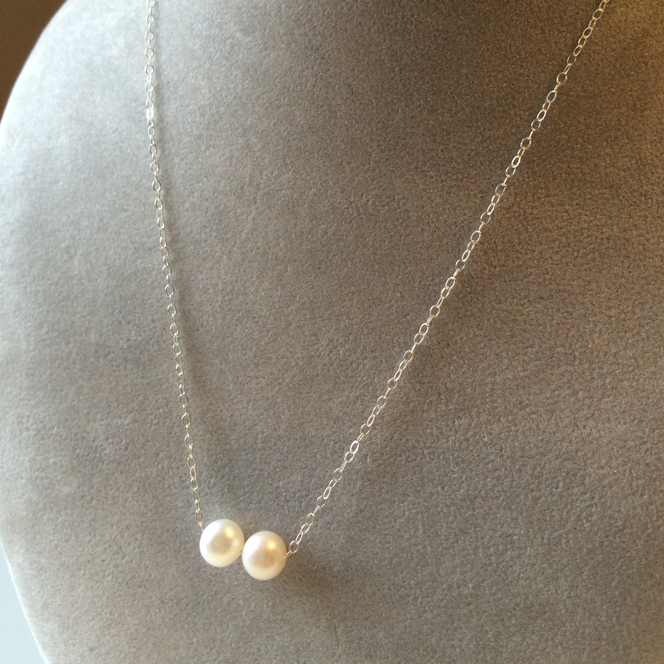 necklace with two pearls