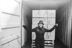 Deborah Semer in the warehouse with the first container ship of Joyboxx