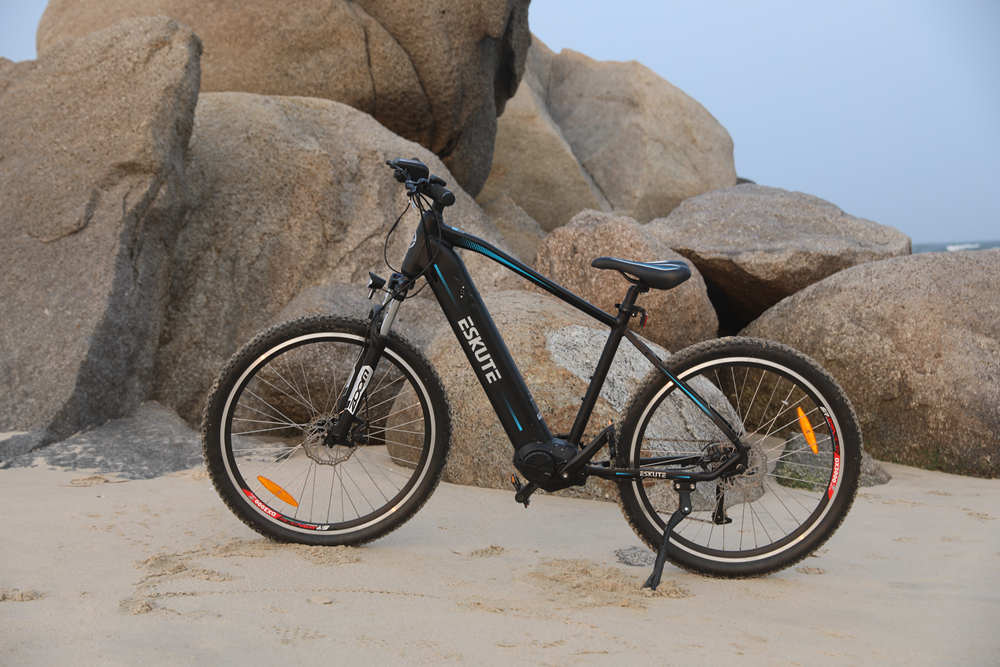 Netuno Pro Electric Mountain Bike on the beach