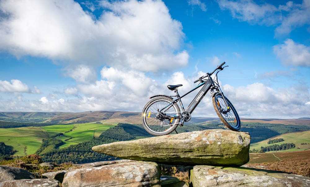 best electric mtb on the rocks of the mountaintop