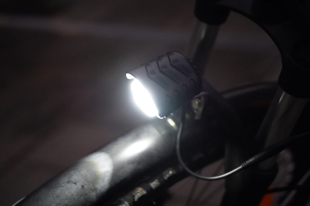 e-bike with light on at night