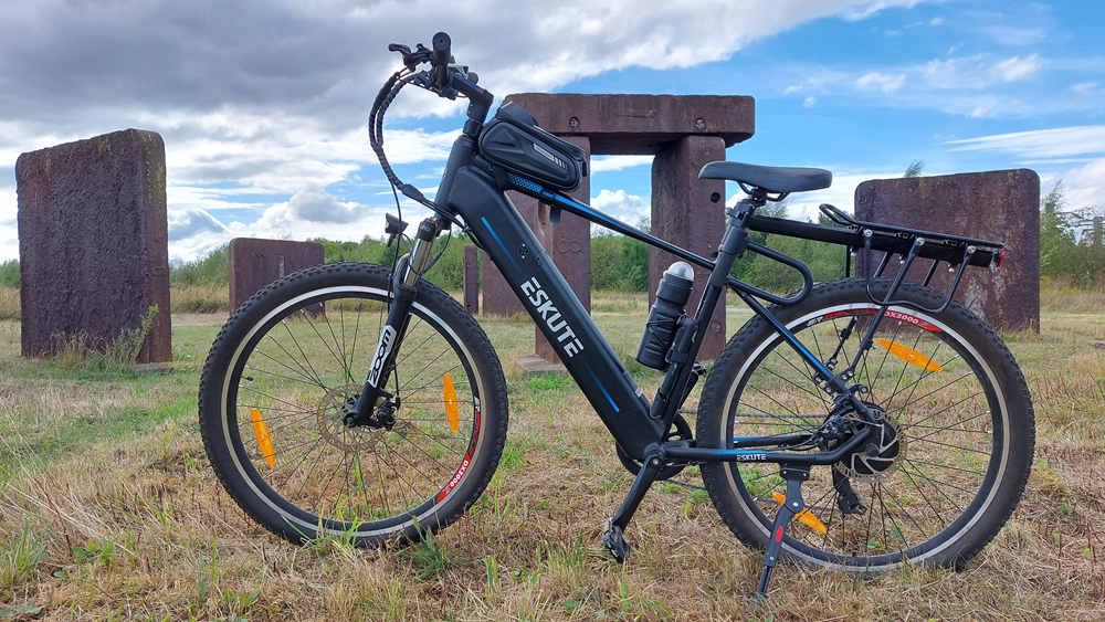 electric push bike with rear hub motor on the grasslands