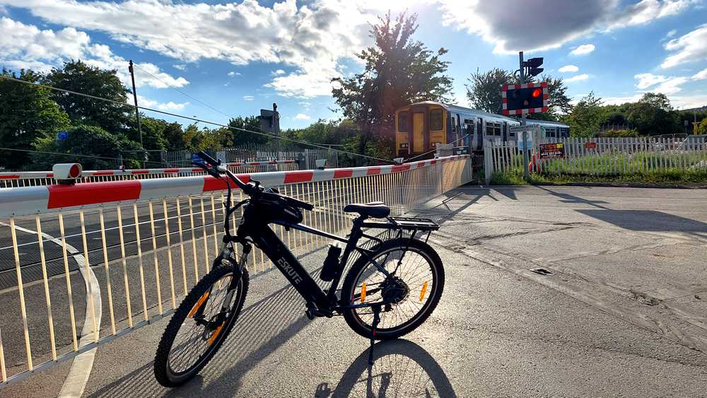 the e-bike is parked near train station