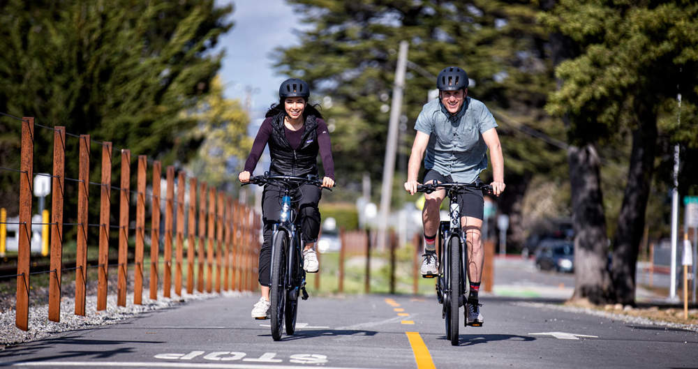 two riders go out in the street by their 350w electric bikes