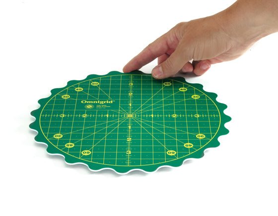 Omnigrid rotating cutting mat