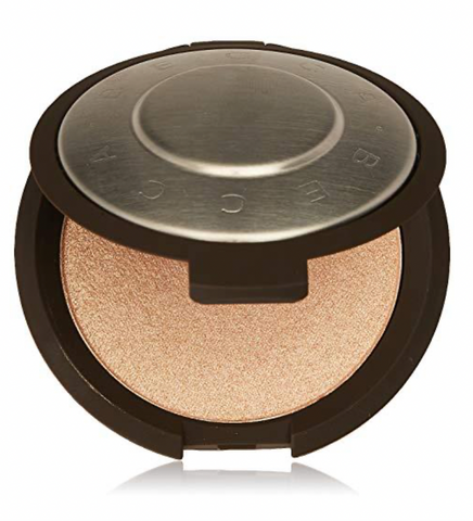 Becca Shimmering Skin Perfector Highlighter in Champagne Pop