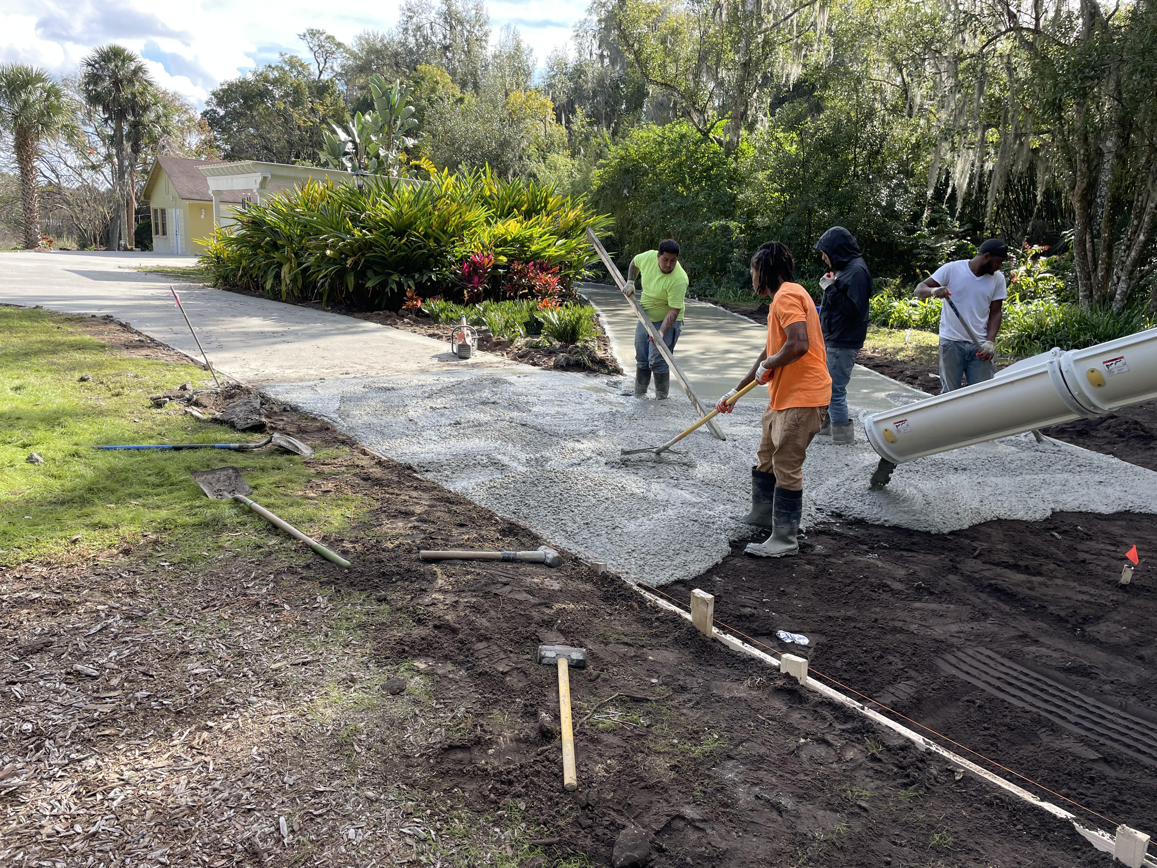 Concrete driveway pour in progress in Lake Helen Florida