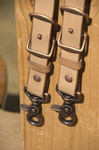 Oiled VegTan straps with antique copper chicago screws, clips and conway buckles. 