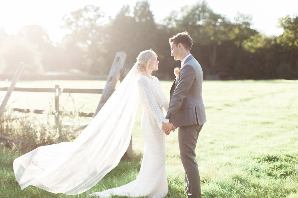 Real bride charlotte wearing dewdrop garland and back necklace