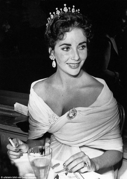 https://www.dailymail.co.uk/femail/article-4500700/The-memorable-Cannes-red-carpet-looks.html Elizabeth Taylor at Cannes Film Festival in 1957 wearing a crystal tiara and earrings