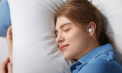 women sleeping with soundcore earbuds