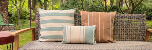 Outdoor bench with colorful throw pillows