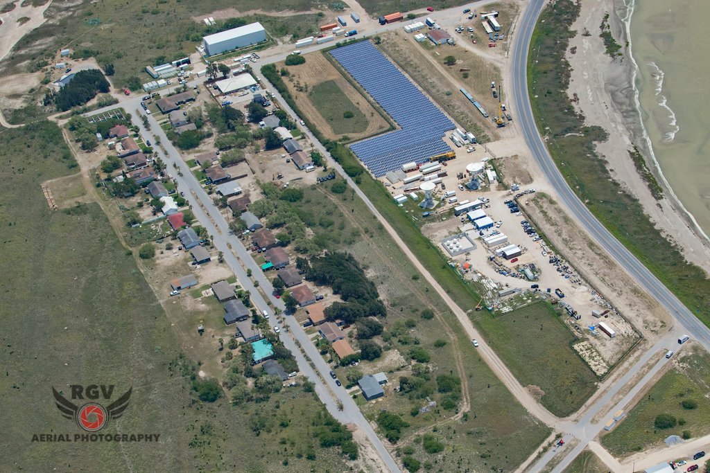 An aerial photograph taken in 2020 of the Starbase Boca Chica village. This was early in the expansion and there is only a single street of homes.