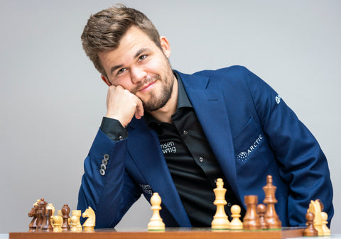 Magnus Carlsen at a chess board