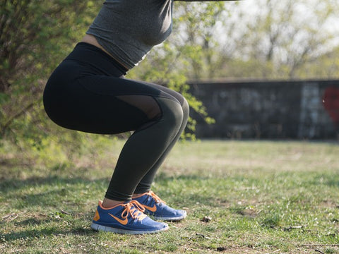 woman strengthening her pelvic floor