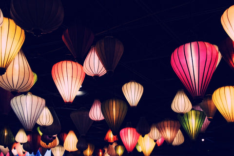 Colorful lanterns in the garden Rovistella Weddings