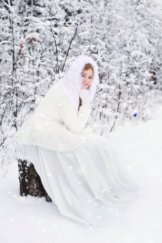 Pretty winter bride in the snow