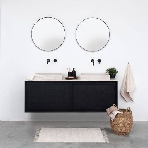 Bathroom set with black wood and beige marble