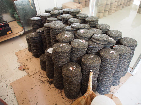 Dried puer cakes ready for wrapping