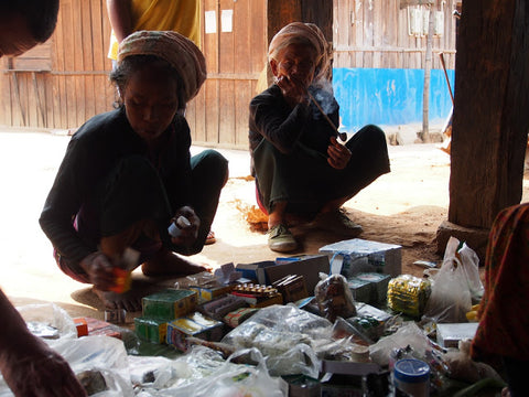 Buying medicine in Mannuo village, Mt. Bulang