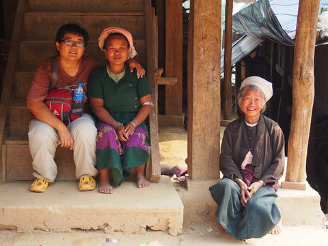 Our driver Ah-Hong with Bulang residents of Man Xin Long village