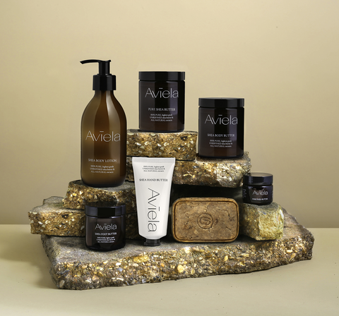 Aviela pure Shea Butter products displayed on a stone