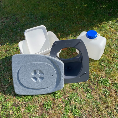 Building composting toilet