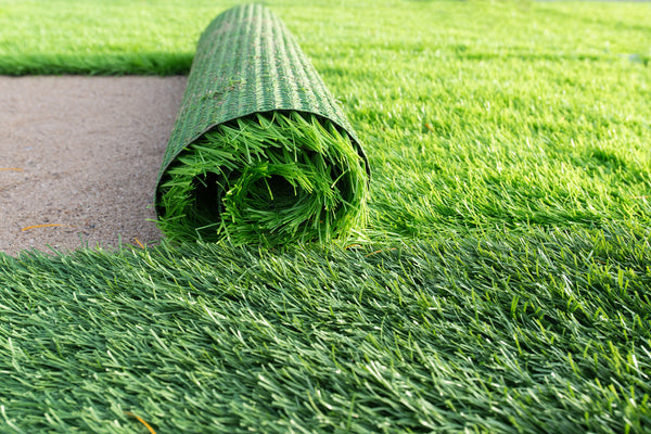 green artificial grass soccer field