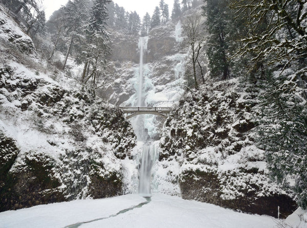 Multnomah Falls Oregon waterfall covered in ice and snow in the Columbia river gorge