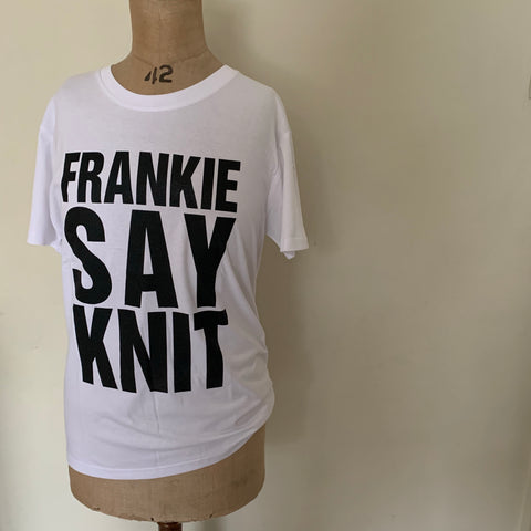 A white t-shirt with the slogan "Frankie Say Knit"