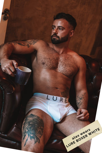 Alex wears LURE boxer white.  Based in London, he models for Lure Menswear representing real people for social inclusive core values.