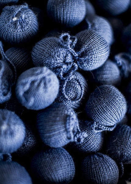 Detailed shot of blue ornaments made with yarn