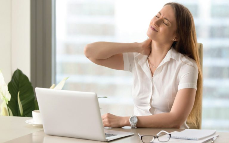 A-woman-at-work-with-neck-pain