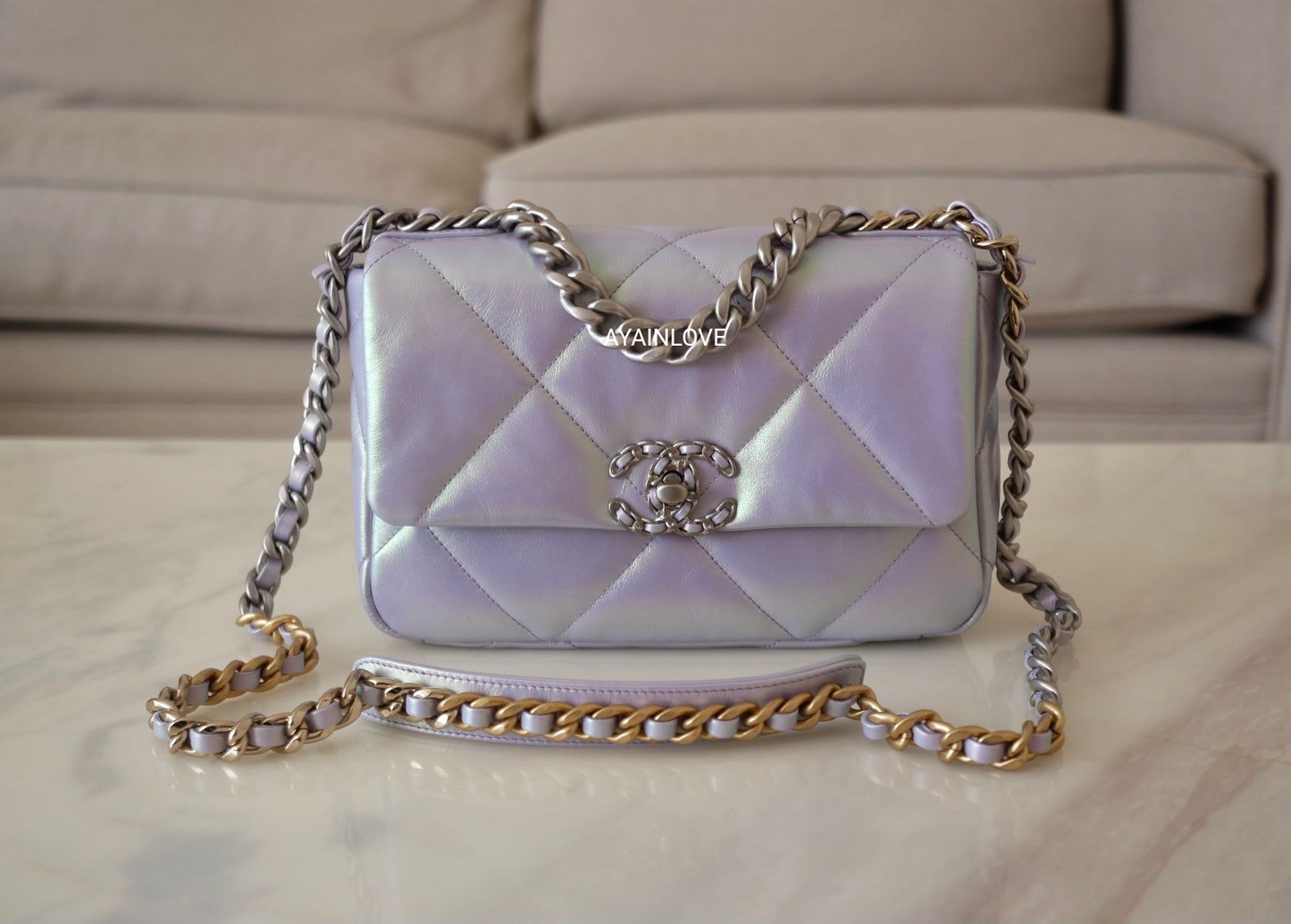 CHANEL 22P Iridescent Light Purple Lamb Skin 19 Small Flap Bag Mixed H –  AYAINLOVE CURATED LUXURIES