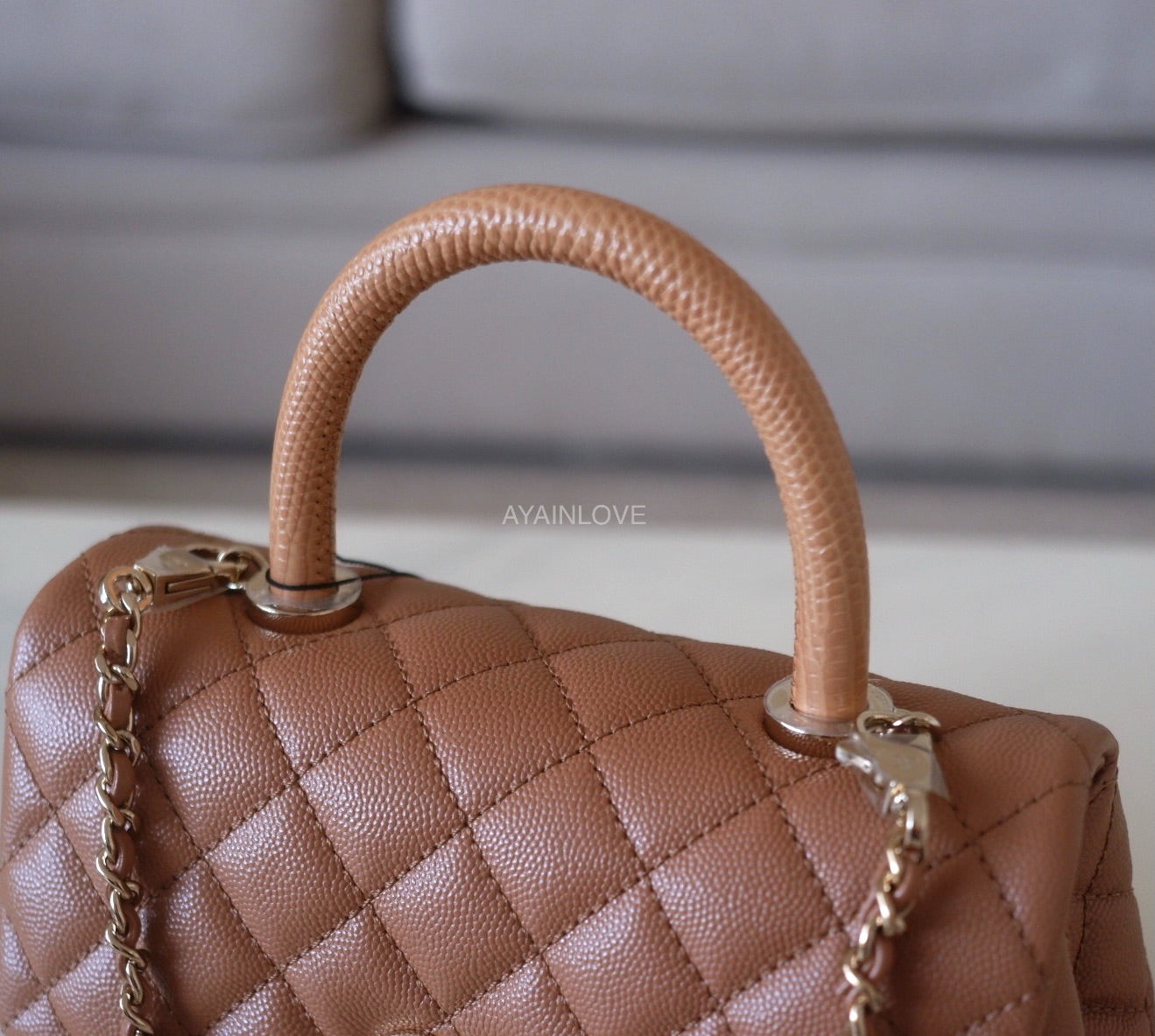 CHANEL 21P Caramel Brown Caviar Small Coco Handle 24 cm Light Gold Har –  AYAINLOVE CURATED LUXURIES