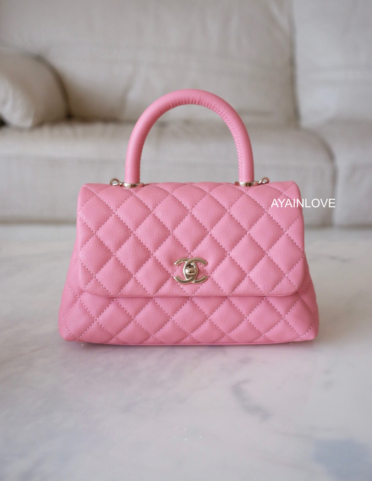 a Pink Caviar Coco Handle Mini 24cm Light Gold Hardware Ayainlove Curated Luxuries