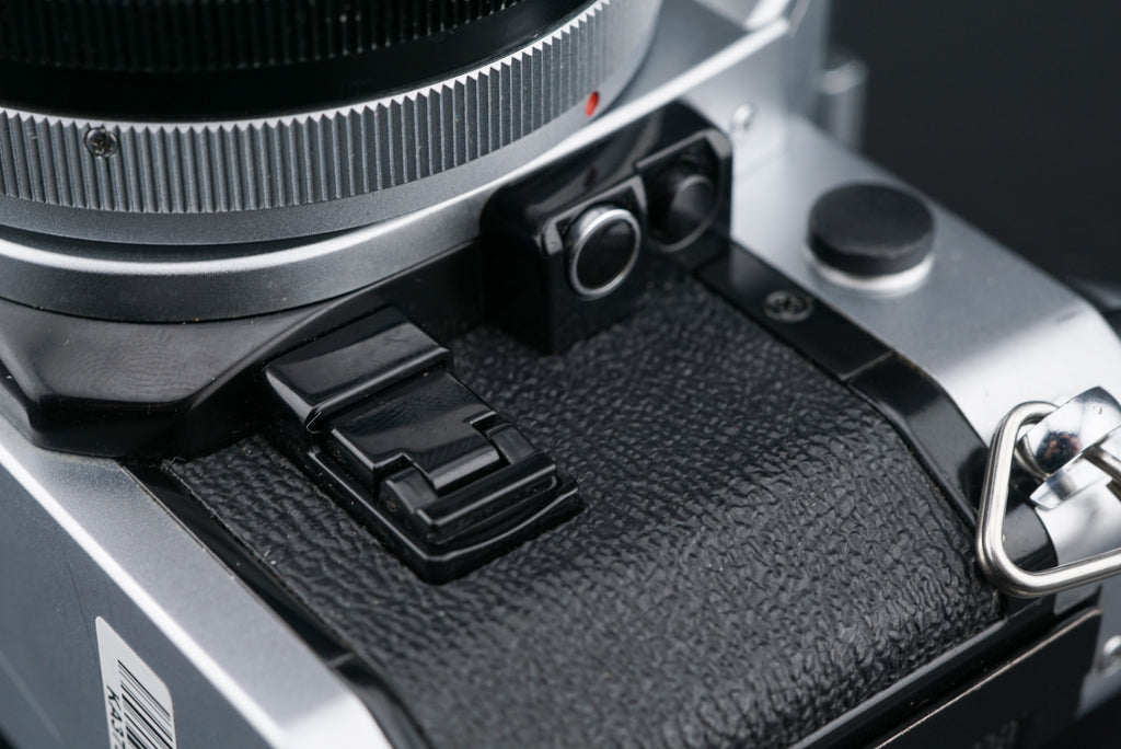 Canon AE-1 Program aperture stop-down tab