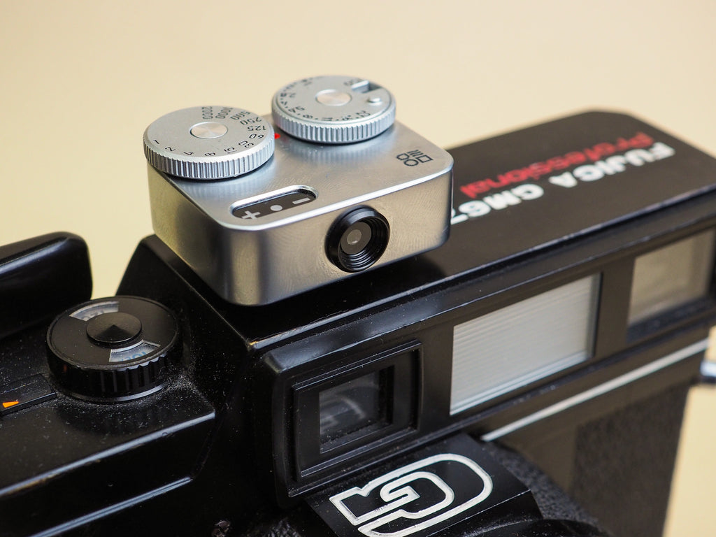 Doomo Light Meter on top of a Film Camera