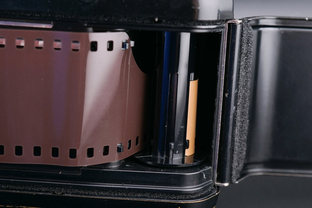 loading the film inside the Yashica FX-3 camera