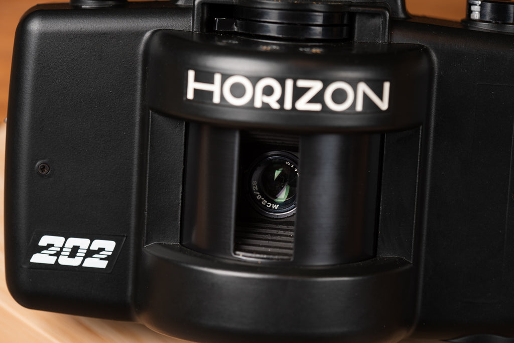 front of a Horizon 202 film camera