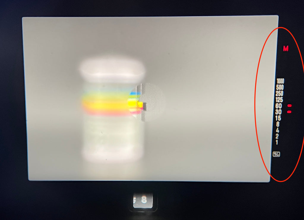 view inside of a viewfinder of a Minolta X-700 film camera