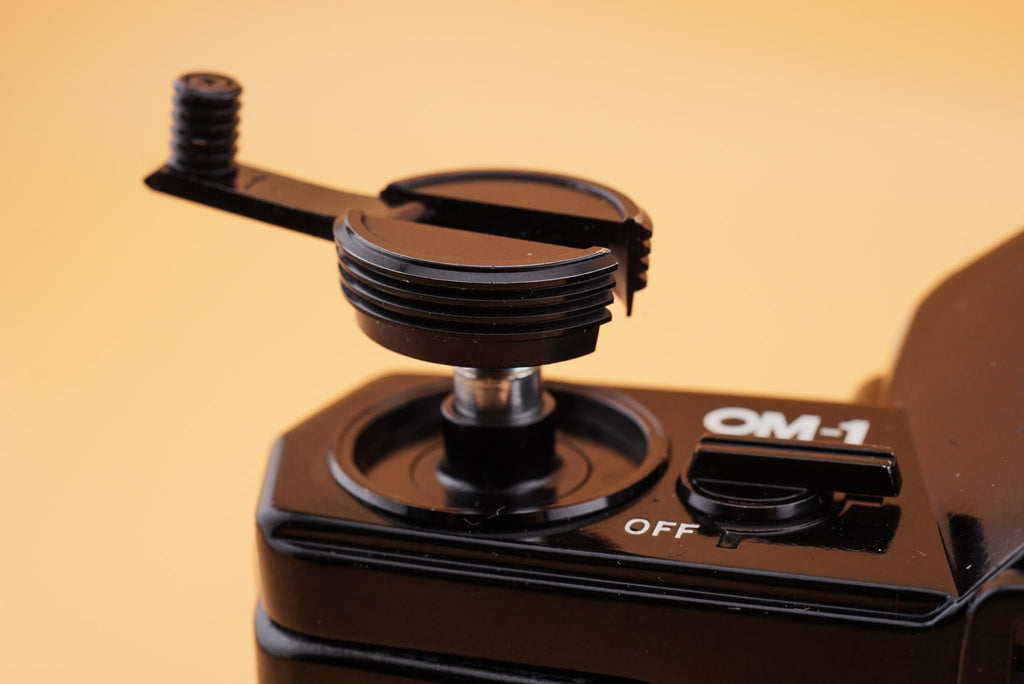 olympus om-1 camera rewind knob