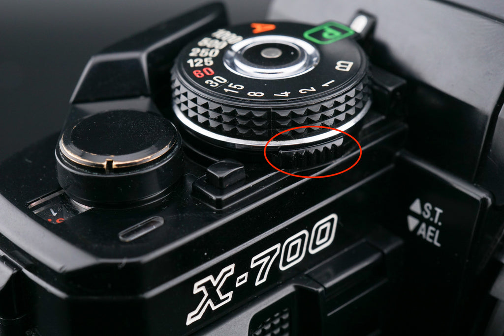 Minolta X-700 film camera shutter speed dial