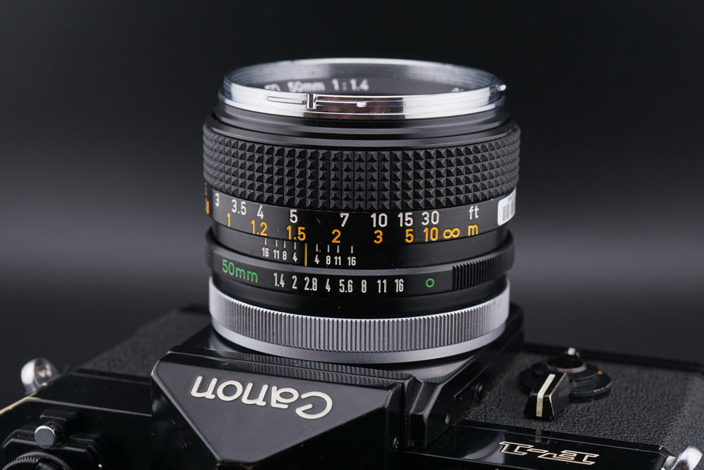 50 mm f1.4 Canon lens mounted into Canon F-1