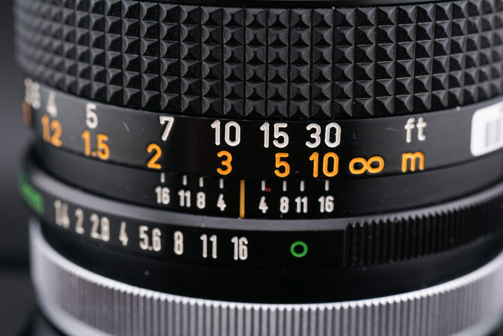 focus ring and hyperfocal scale of a Canon FD 50mm lens