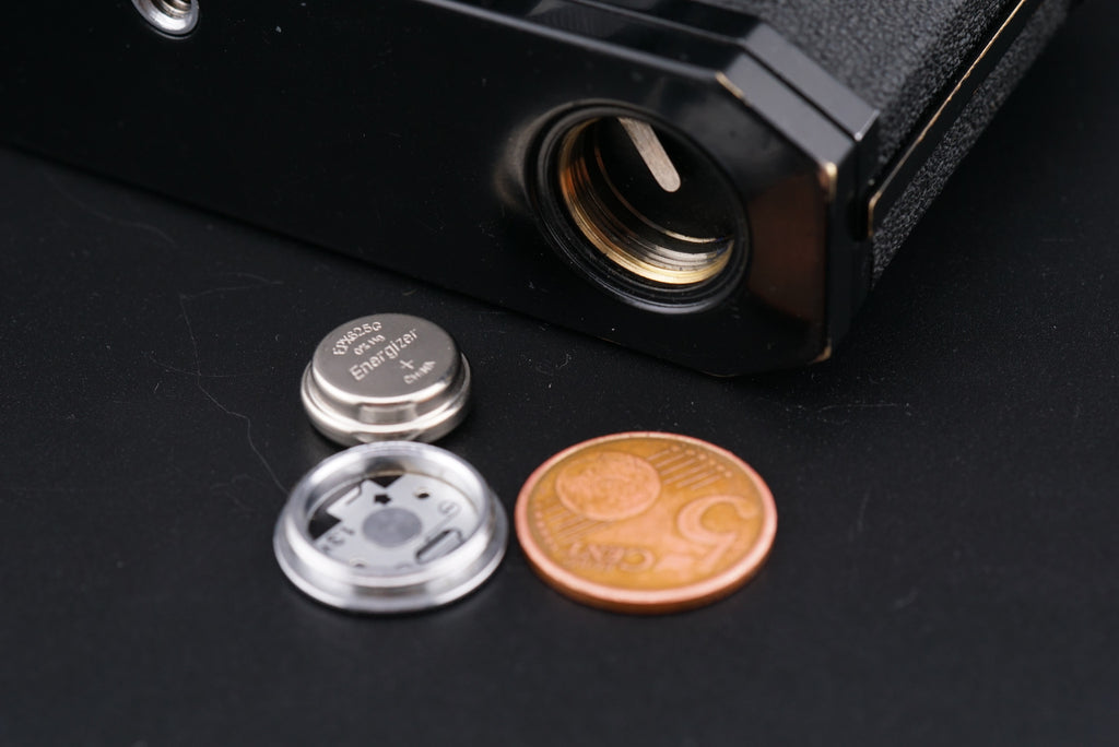 Canon F-1 camera battery compartment open