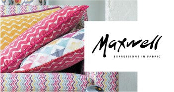 Maxwell Fabrics logo and image of pink pillows with patterns