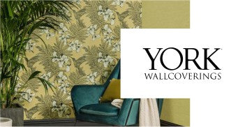 york wallcoverings logo and room with green chair and plant