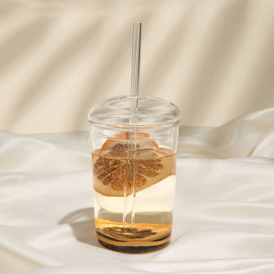 https://cdn.shopify.com/s/files/1/0521/9899/8178/products/kessellate-dome-lid-glass-tumbler-with-straw-368737.jpg?v=1685917975&width=533